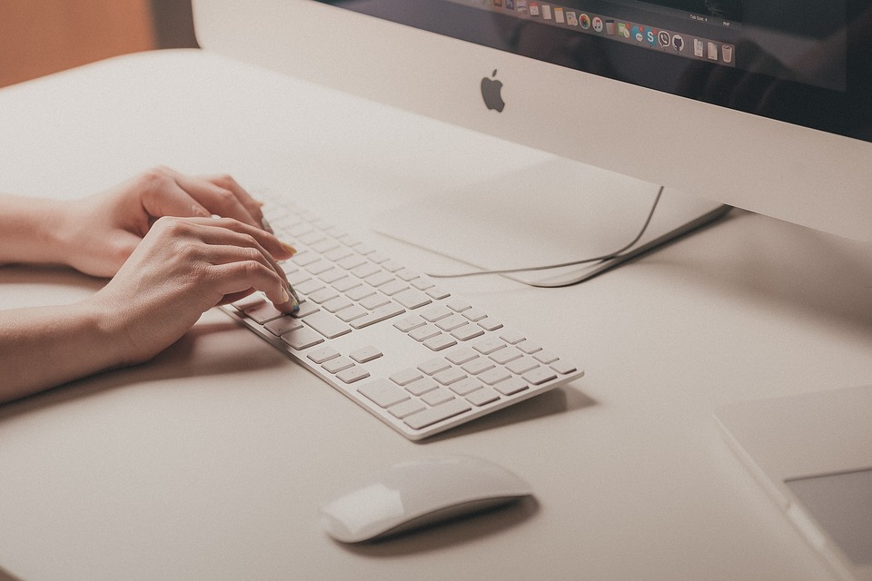 Online safety. Apple mac and keyboard